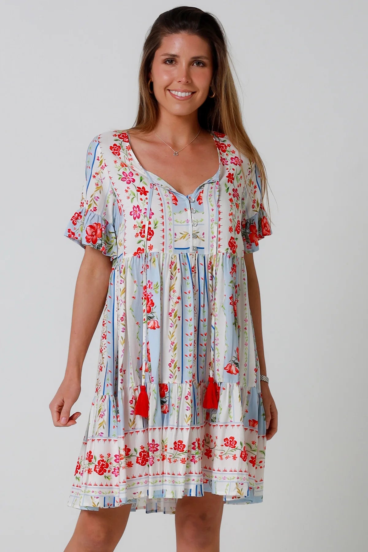 Boho mini dress with tassels v-neckline frill sleeves and border print in florals - Cherry Blossom Mini Dress Australia