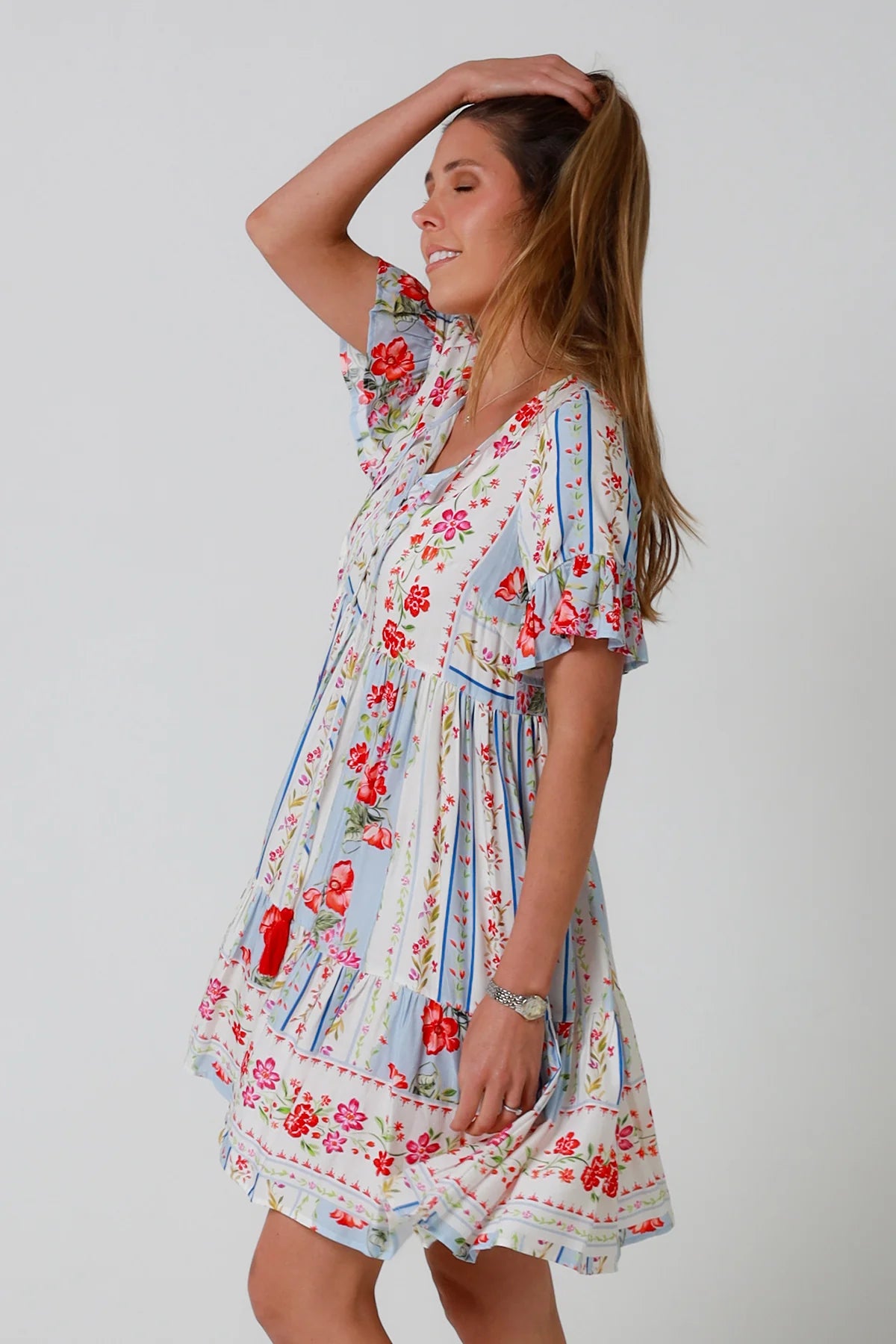 Boho mini dress with tassels v-neckline frill sleeves and border print in florals - Cherry Blossom Mini Dress Australia
