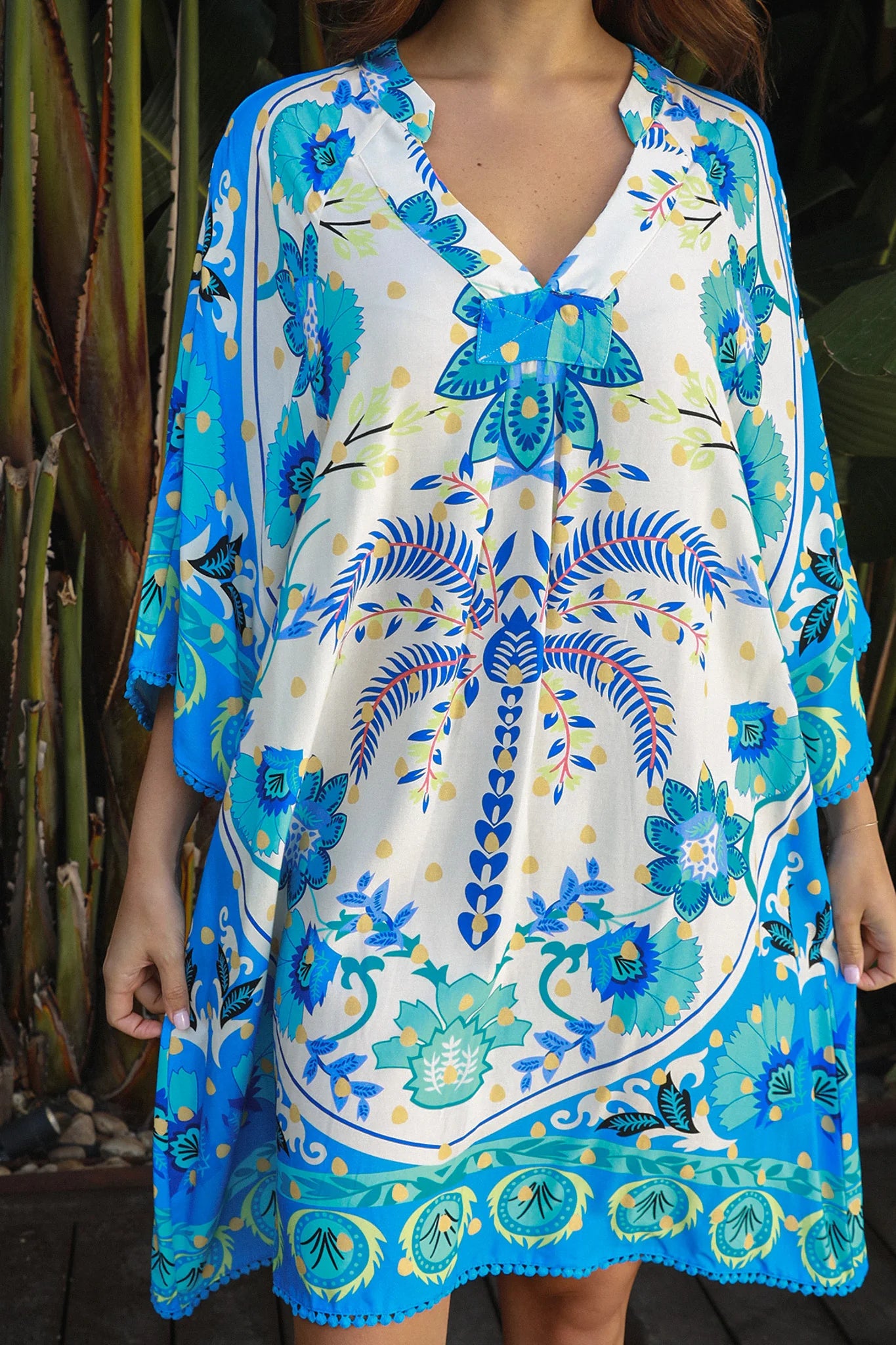 Dreamcatcher Azure Palm rayon mini dress with crochet kimono sleeves and crochet hem