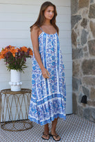 Blue floral round-neck maxi dress in 100% rayon with statement border hem