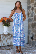 Blue floral round-neck maxi dress in 100% rayon with statement border hem