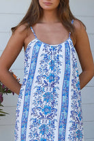 Blue floral round-neck maxi dress in 100% rayon with statement border hem