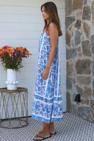 Blue floral round-neck maxi dress in 100% rayon with statement border hem