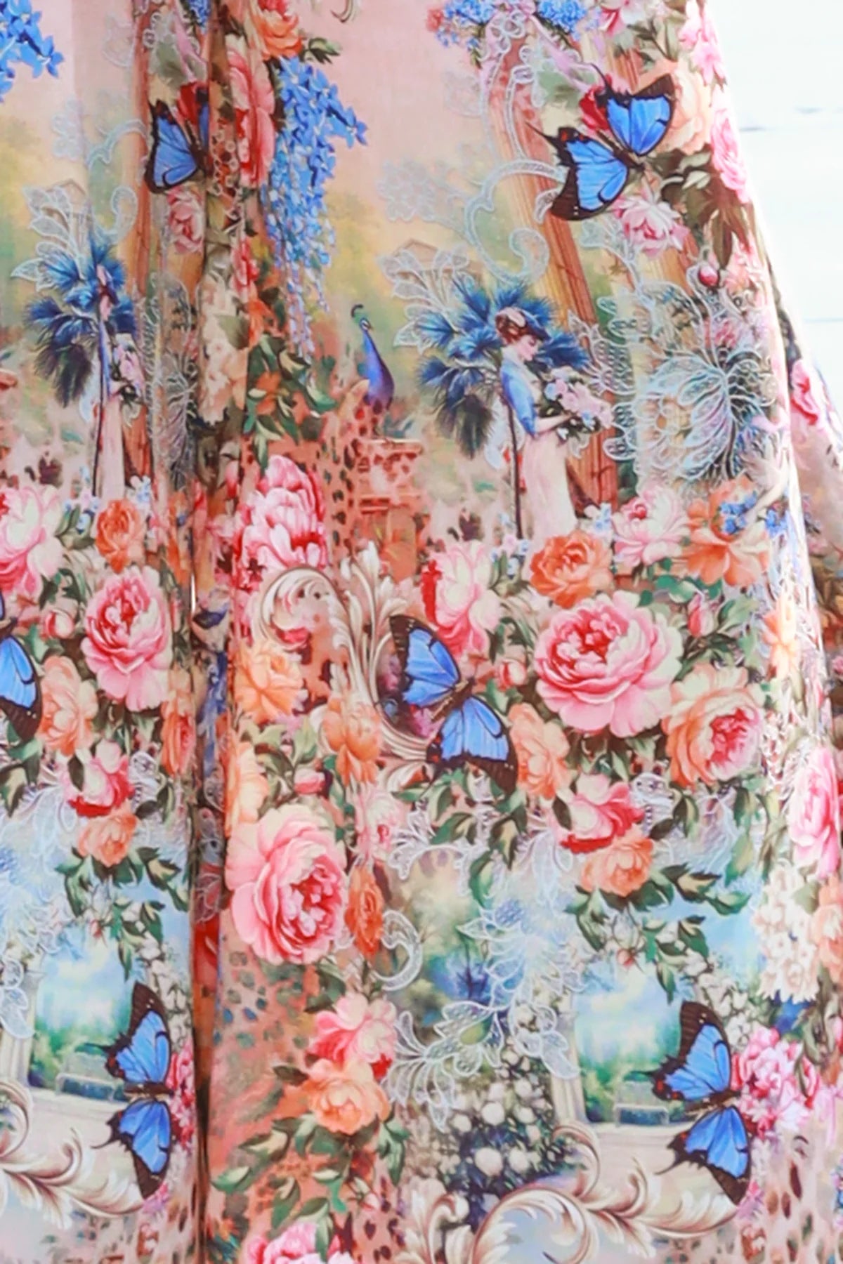 Woman wearing Hannah Blouse in soft rayon with three quarter elastic sleeves and gathered back yoke boho style