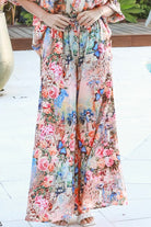 Woman wearing Hanna Pant Rayon with butterfly floral print wide leg silhouette – boho pants Australia