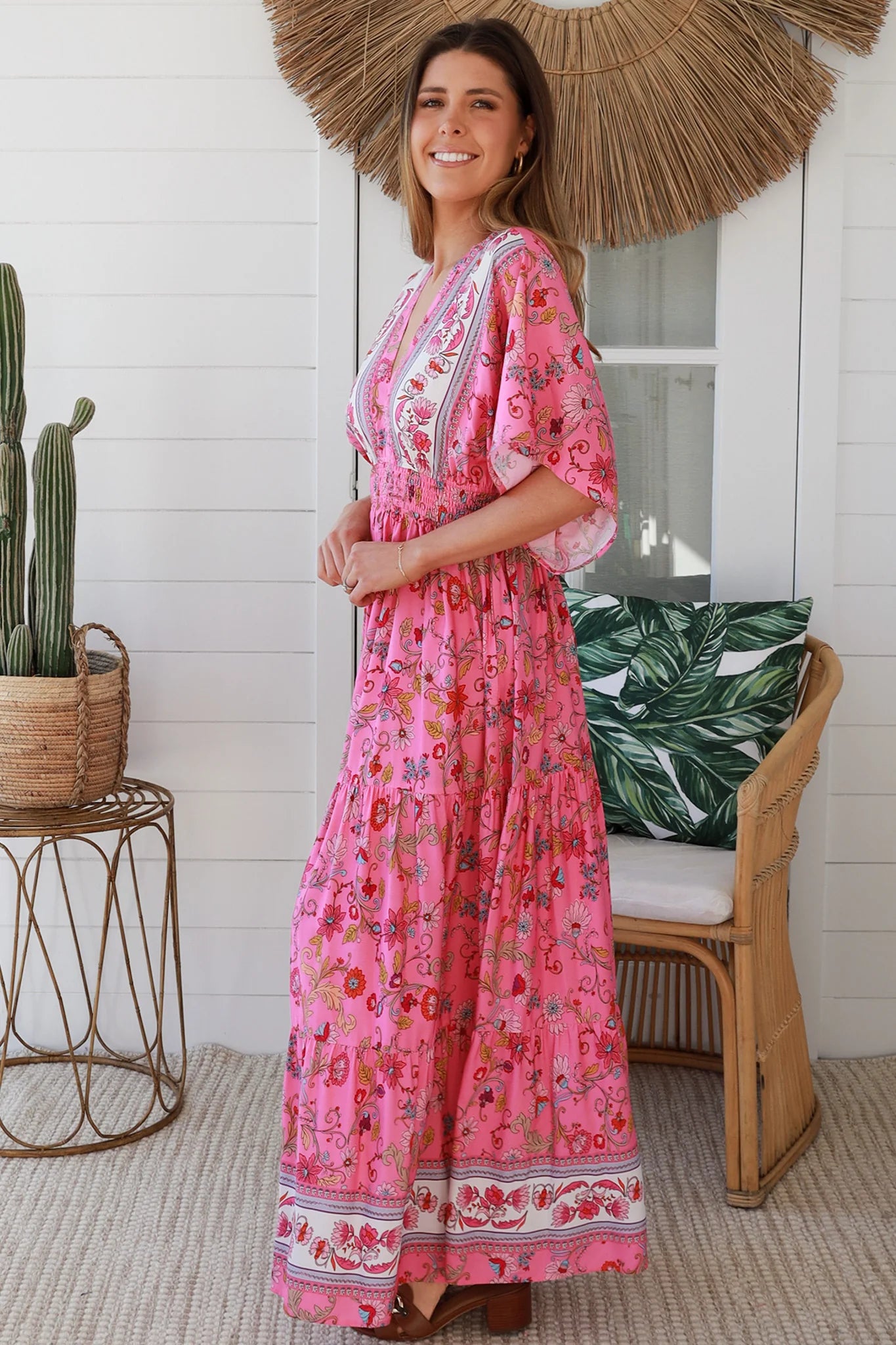 Boho maxi dress Australia in pink floral rayon with tiered skirt border print neckline summer beach style - Eliana Bloom.