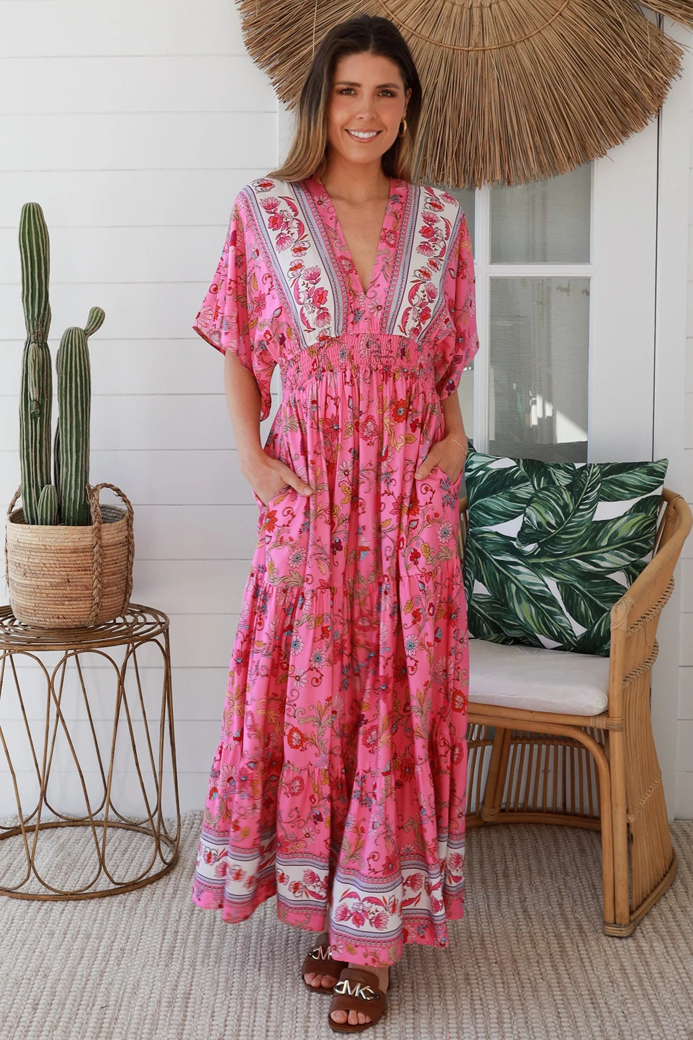 Boho maxi dress Australia in pink floral rayon with tiered skirt border print neckline summer beach style - Eliana Bloom.