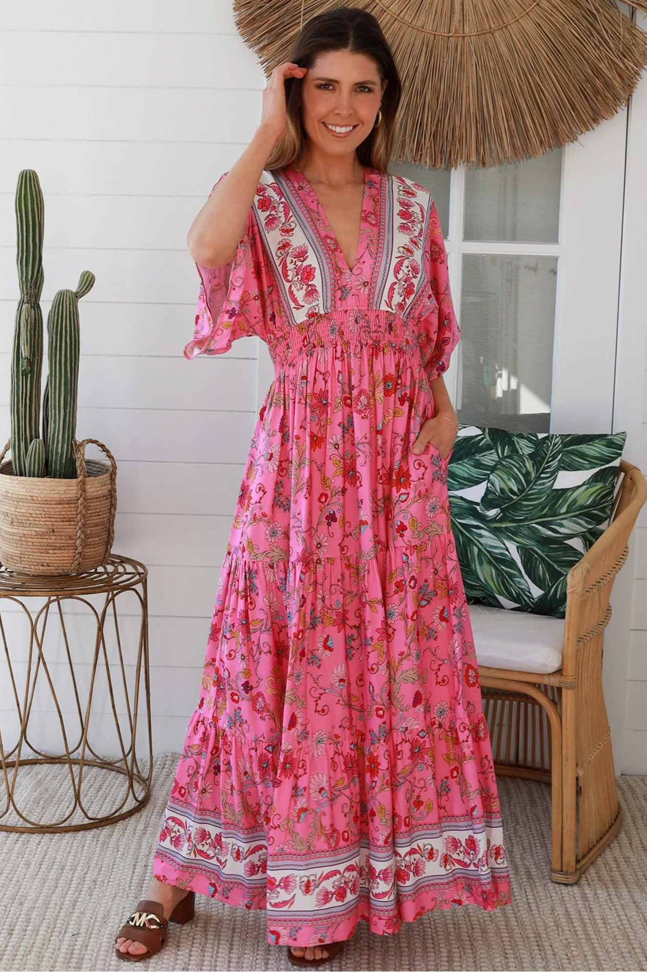 Boho maxi dress Australia in pink floral rayon with tiered skirt border print neckline summer beach style - Eliana Bloom.