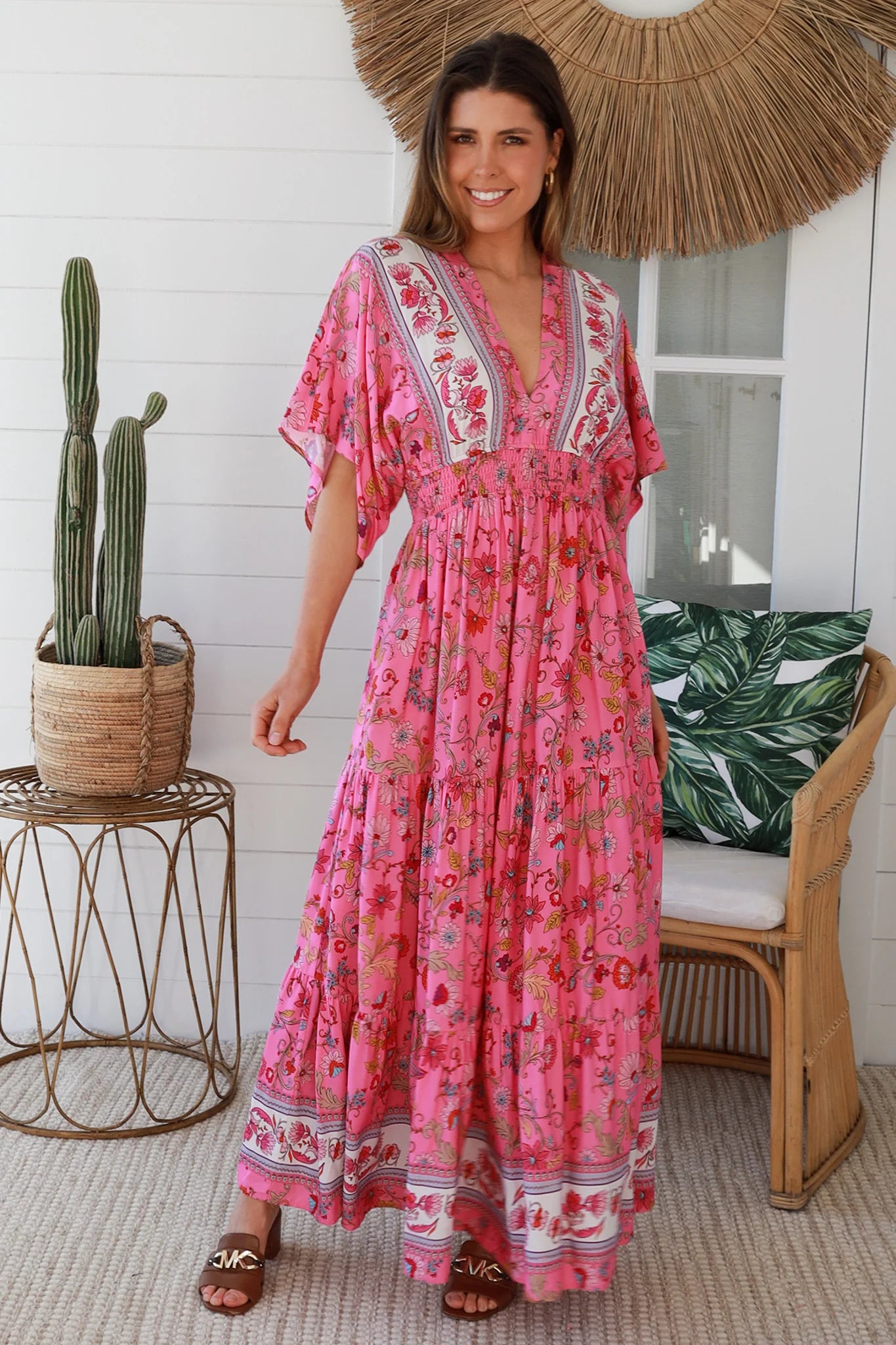 Boho maxi dress Australia in pink floral rayon with tiered skirt border print neckline summer beach style - Eliana Bloom.