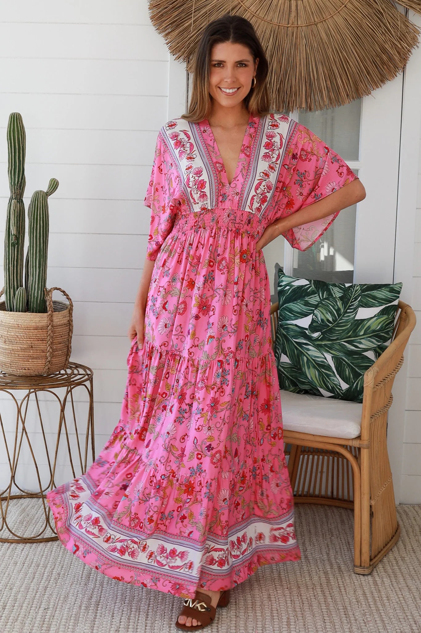 Boho maxi dress Australia in pink floral rayon with tiered skirt border print neckline summer beach style - Eliana Bloom.