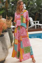 Wide leg patchwork paisley boho pants by Dreamcatcher with elastic waist and colourful bandana print