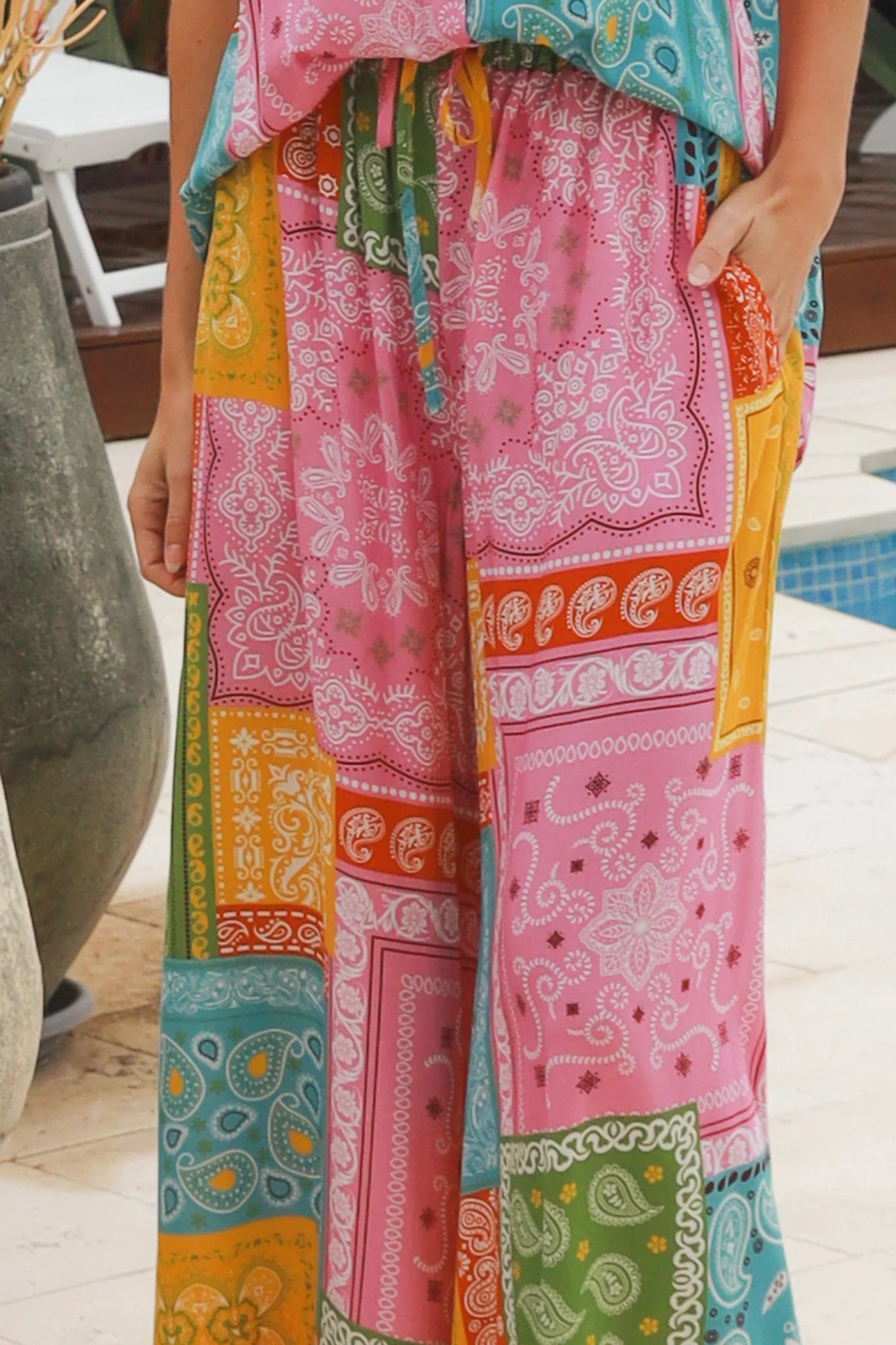 Wide leg patchwork paisley boho pants by Dreamcatcher with elastic waist and colourful bandana print