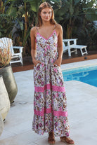 Pink floral tiered maxi dress with lace inserts, drawstring waist, pockets and adjustable straps — Charlotte The Label