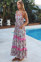 Pink floral tiered maxi dress with lace inserts, drawstring waist, pockets and adjustable straps — Charlotte The Label