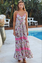 Pink floral tiered maxi dress with lace inserts, drawstring waist, pockets and adjustable straps — Charlotte The Label
