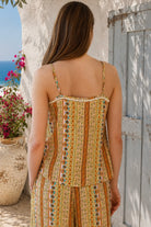 Amara rayon slip top by Dreamcatcher with multicoloured boho stripe print, adjustable straps and white cotton lace trim.