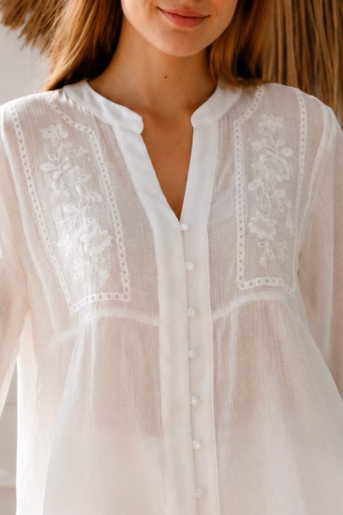 Paige white embroidered blouse by Salty Palm with floral panels, split neckline and long relaxed sleeves