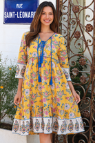 Golden Dahlia Peacock Feather cotton boho dress with cobalt tassels and ornate floral border print