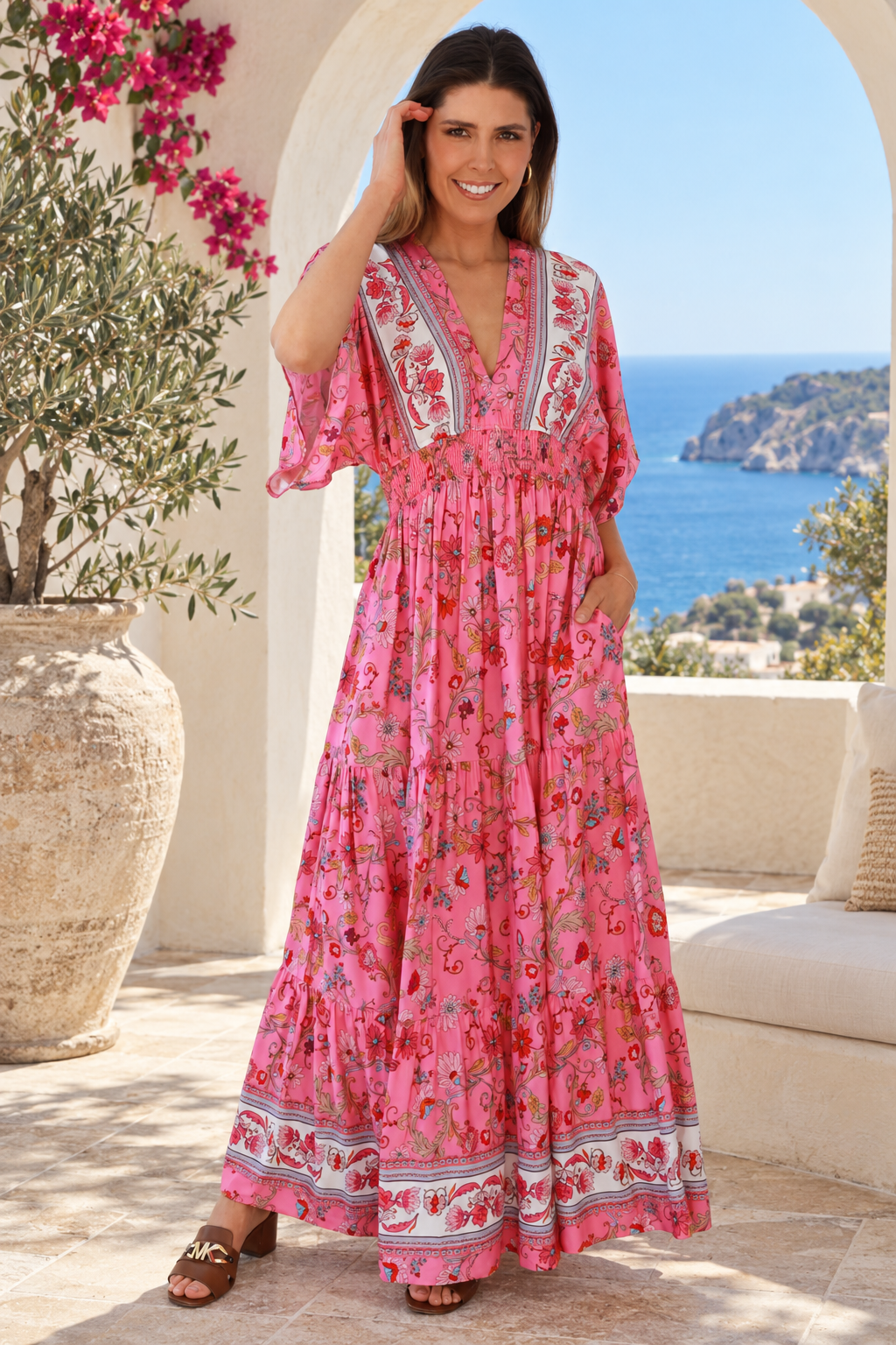 Eliana Bloom pink floral rayon boho maxi dress with V-neckline, smocked waist and tiered skirt.