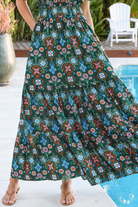 Emily bohemian maxi dress in green rayon with flutter sleeves tiered skirt and shirred back