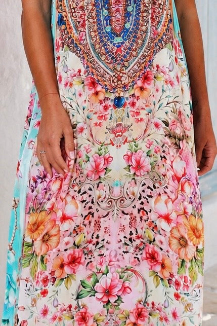 Peacock Feather Mirage floral maxi dress with adjustable straps and rhinestone embellished bodice