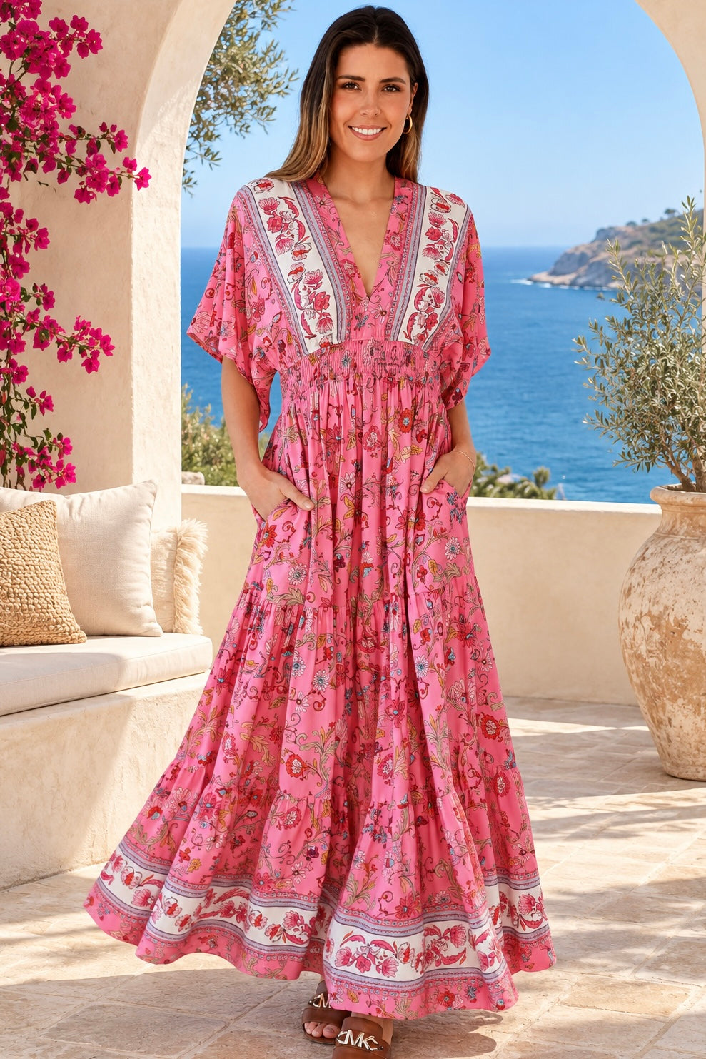 Eliana Bloom pink floral rayon boho maxi dress with V-neckline, smocked waist and tiered skirt.