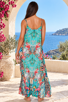 Mirage aqua blue rhinestone maxi dress in viscose crepe with vivid floral placement print and flowing skirt