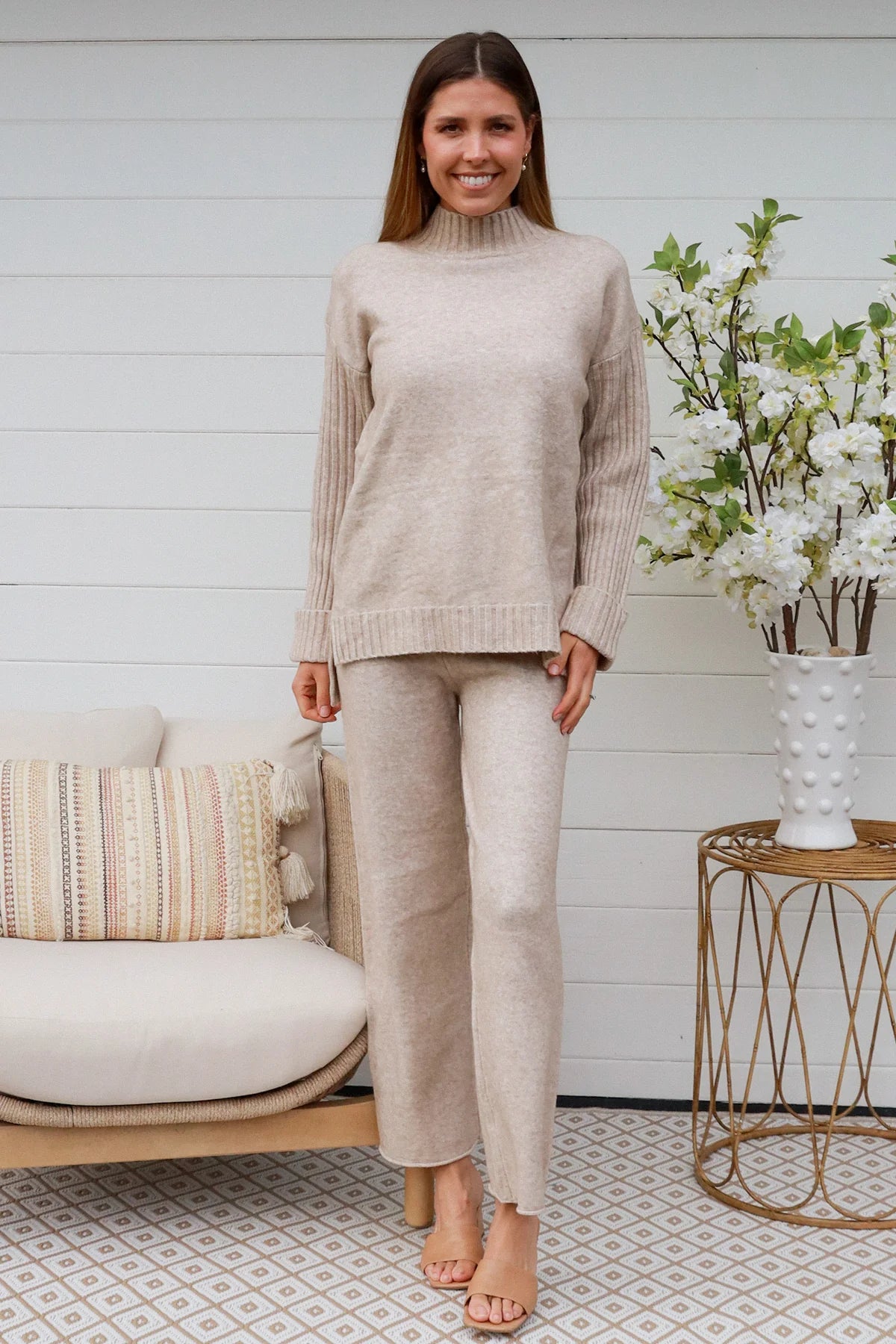 Woman in vanilla knit lounge set with ribbed sweater and wide-leg pants - boho knitwear co-ord set - Bohemian Love Runway.