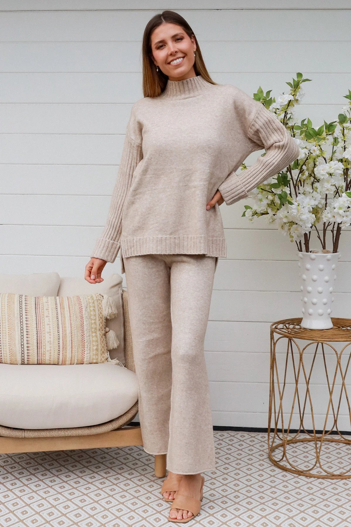 Woman in vanilla knit lounge set with ribbed sweater and wide-leg pants - boho knitwear co-ord set - Bohemian Love Runway.