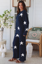 Charlotte The Label Star Soft Brushed Knit Pants in navy featuring a soft brushed knit, closely placed white star design, wide-leg silhouette and elastic waistband.