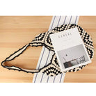 Handmade black and cream hand-stitched square crochet market bag - Moonflower Crochet Market Bag by Bohemian Love Runway.