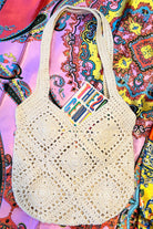 Vanilla crochet shoulder bag with slouchy artisan texture perfect for summer days and boho styling.