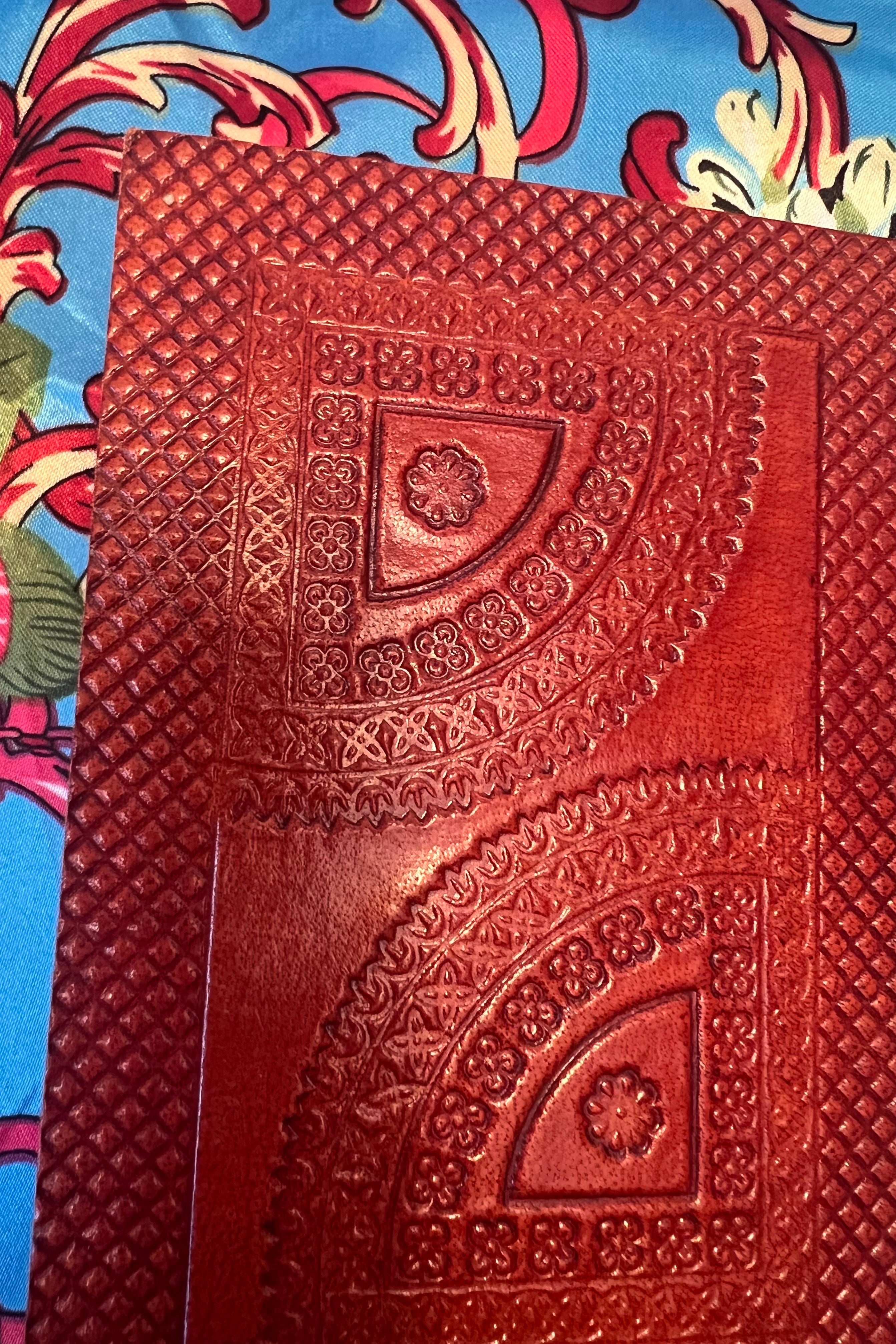 Hand-tooled leather B5 journal with colourful embroidered mandala and sky-blue ribbon - artisan boho notebook.