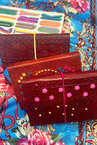 Hand-tooled leather B5 journal with colourful embroidered mandala and sky-blue ribbon - artisan boho notebook.