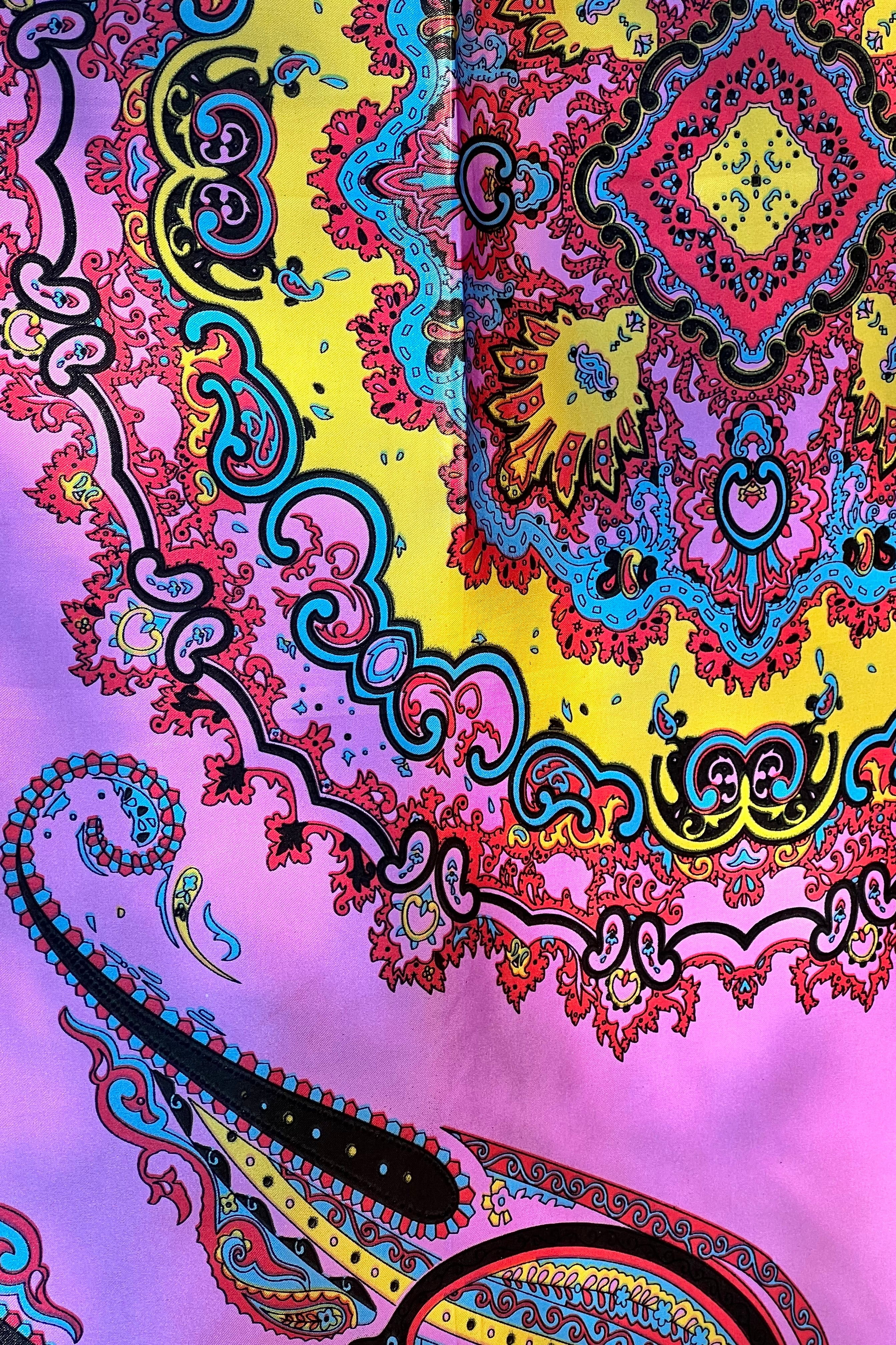 Bright silk satin scarf with paisley and mandala print in lilac, yellow, coral and teal. 90x90cm. Polyester with luxe sheen.