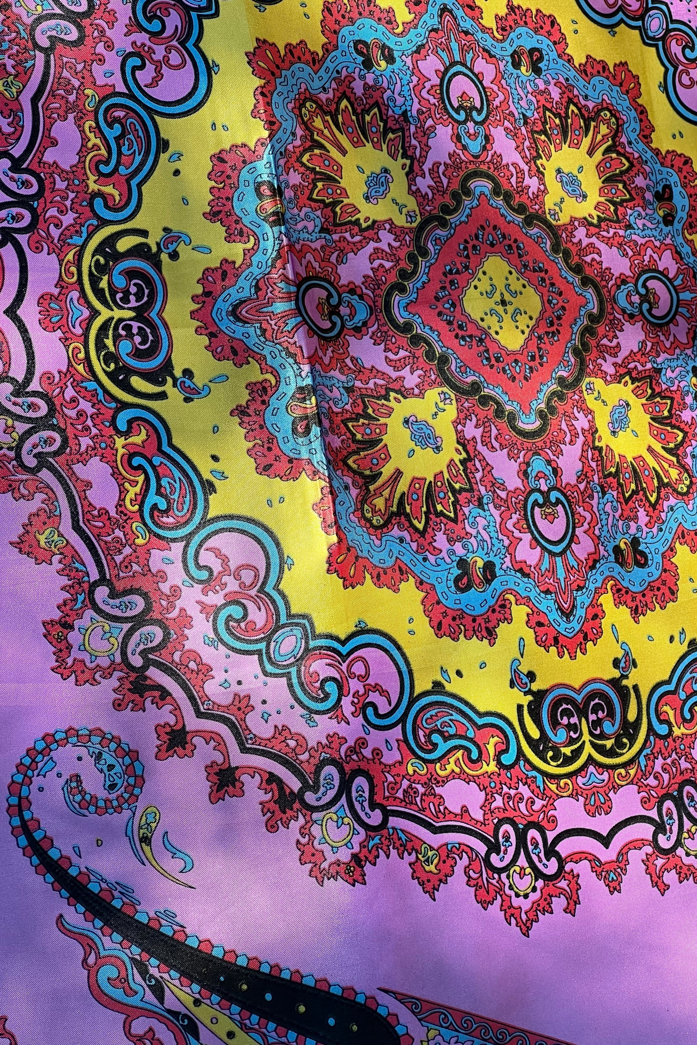 Bright silk satin scarf with paisley and mandala print in lilac, yellow, coral and teal. 90x90cm. Polyester with luxe sheen.