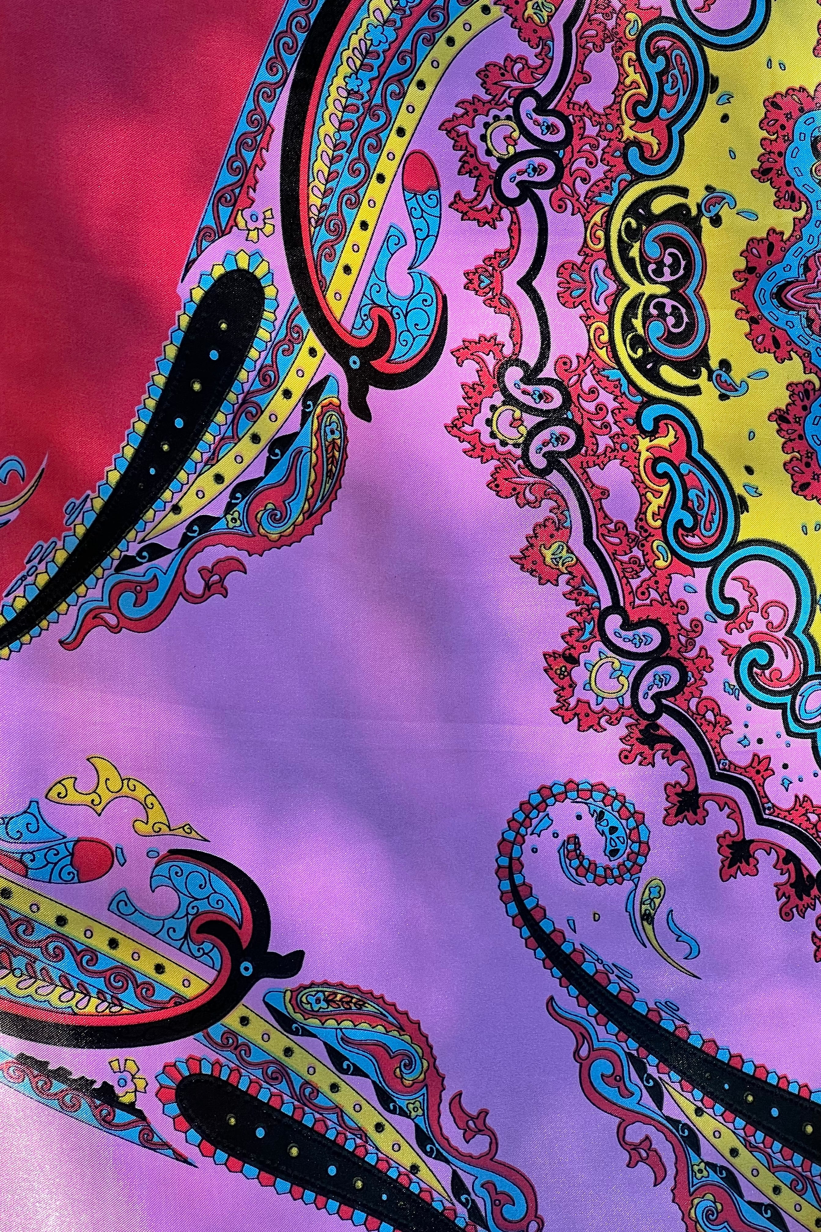 Bright silk satin scarf with paisley and mandala print in lilac, yellow, coral and teal. 90x90cm. Polyester with luxe sheen.