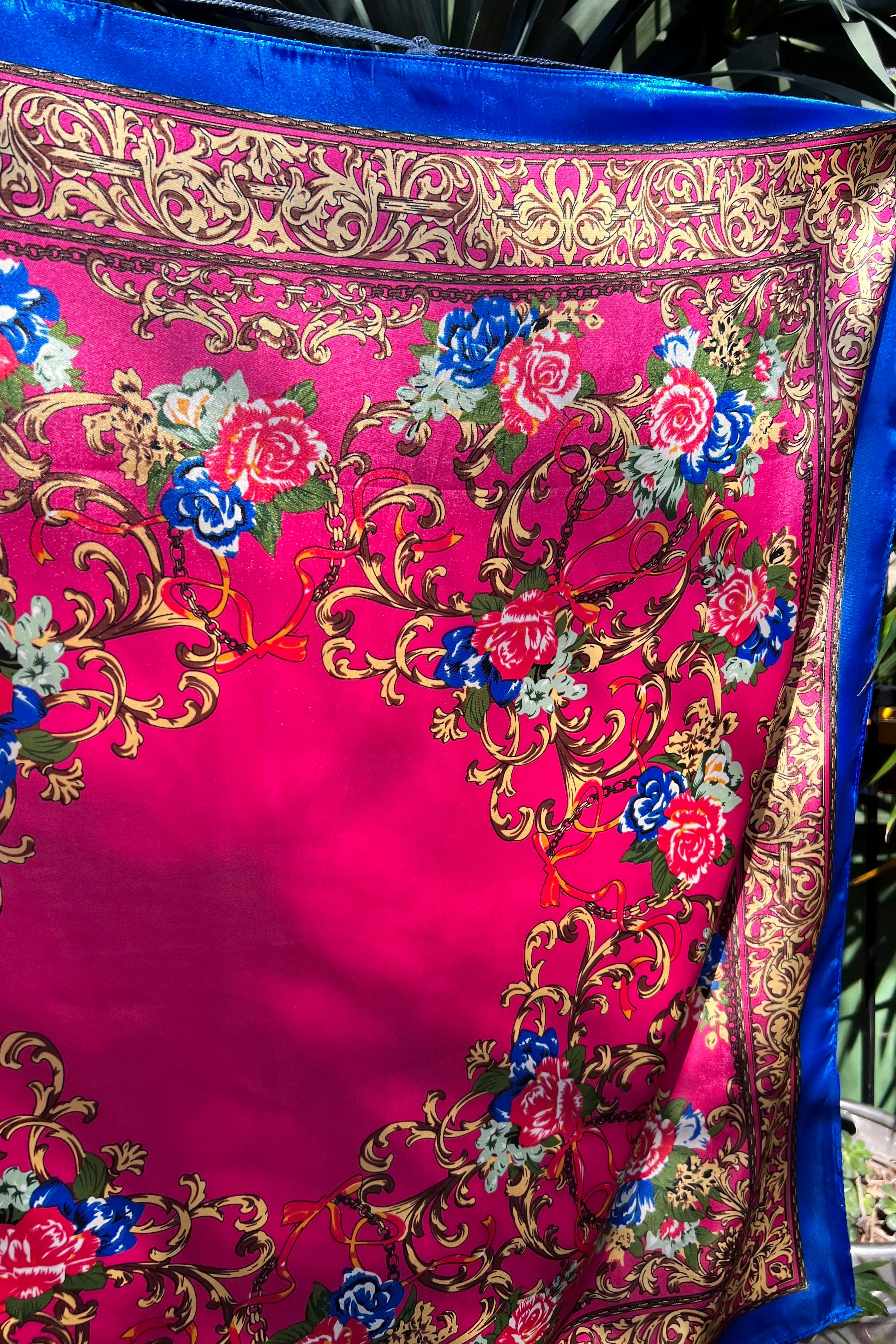 Square pink satin scarf with ornate gold filigree and red and blue floral print - Bohemian Love Runway accessory.