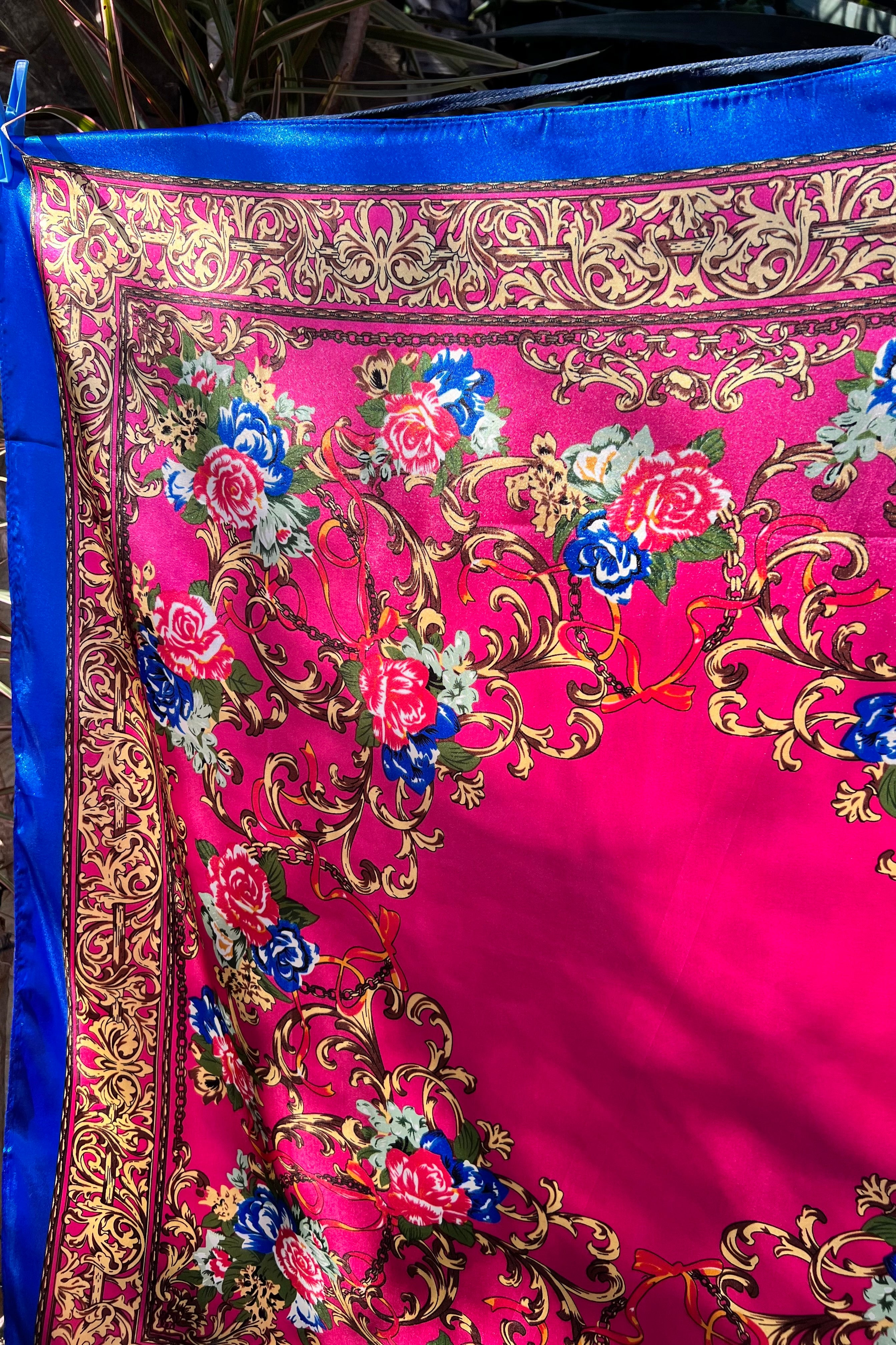 Square pink satin scarf with ornate gold filigree and red and blue floral print - Bohemian Love Runway accessory.