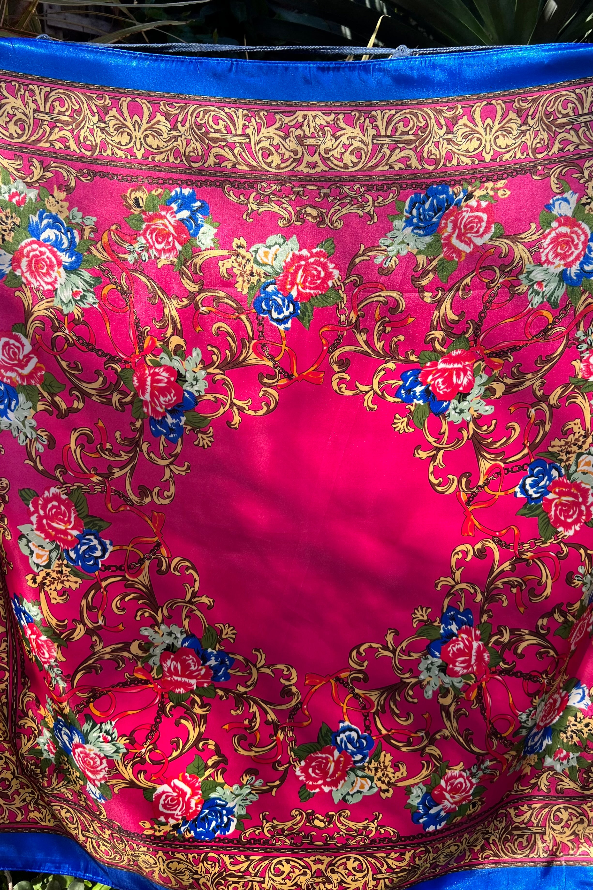 Square pink satin scarf with ornate gold filigree and red and blue floral print - Bohemian Love Runway accessory.