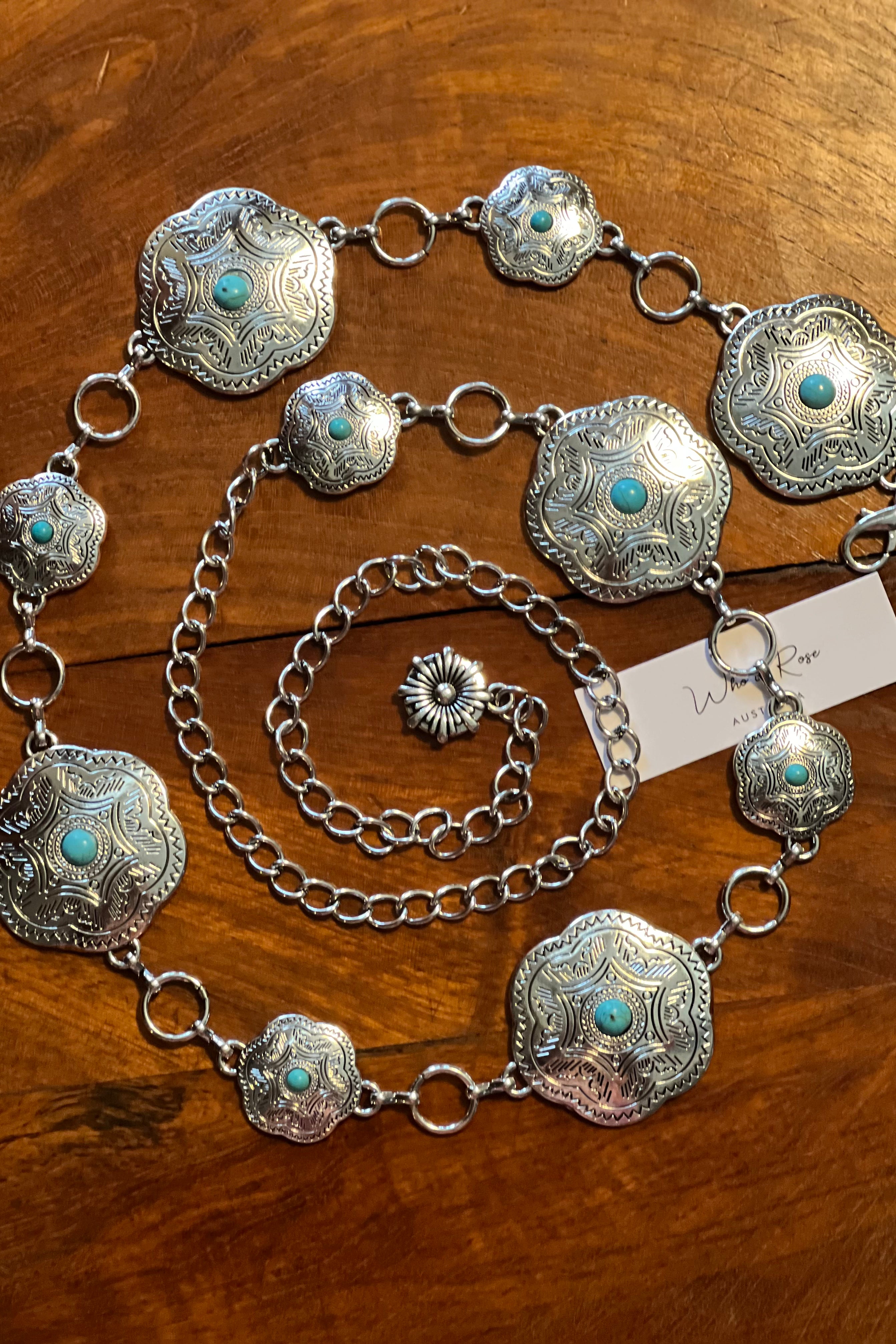 Western festival silver concho chain belt with turquoise stones - boho accessory at Bohemian Love Runway.