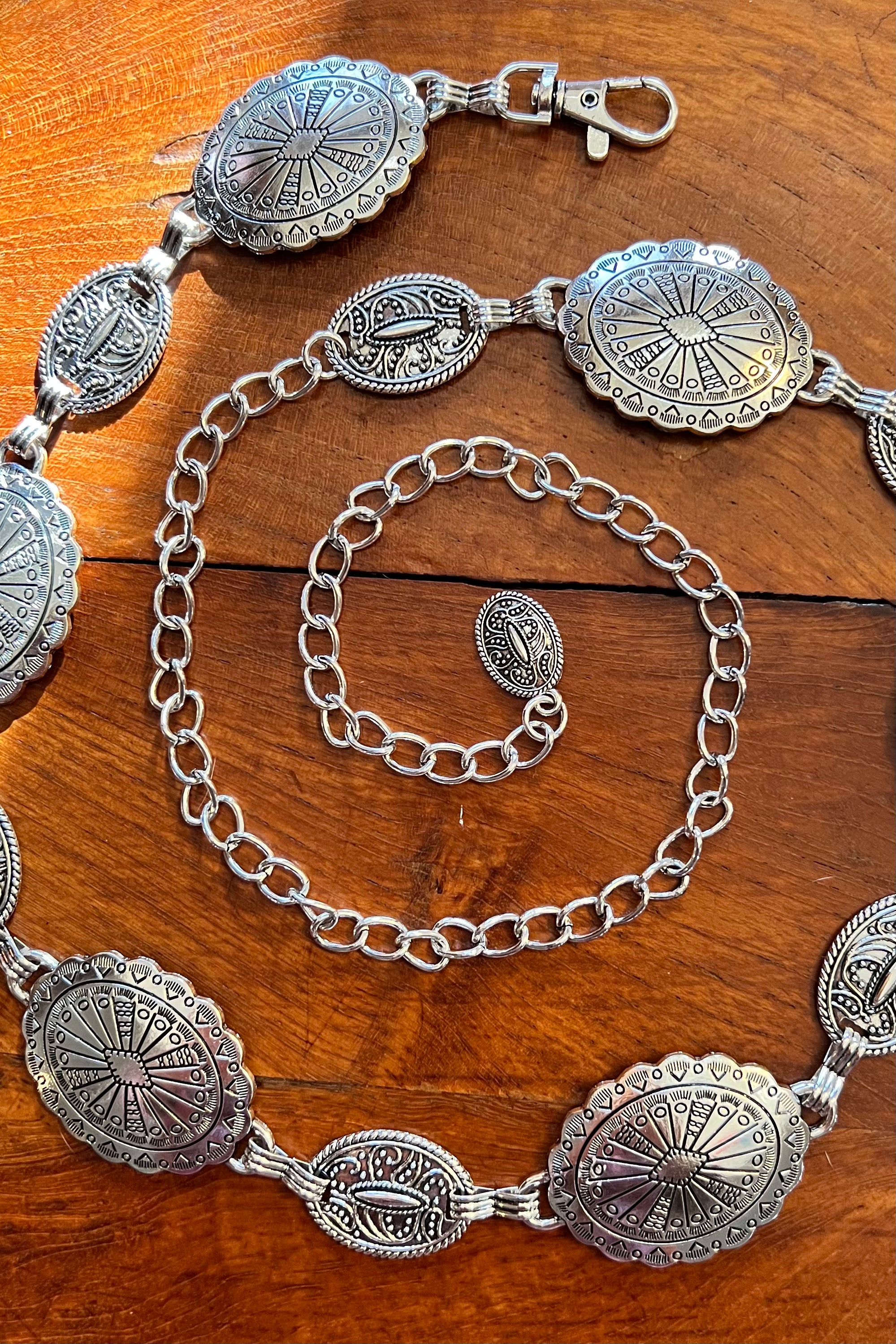 Silver finish concho chain belt with engraved oval medallion and extender - boho festival waist belt Australia.