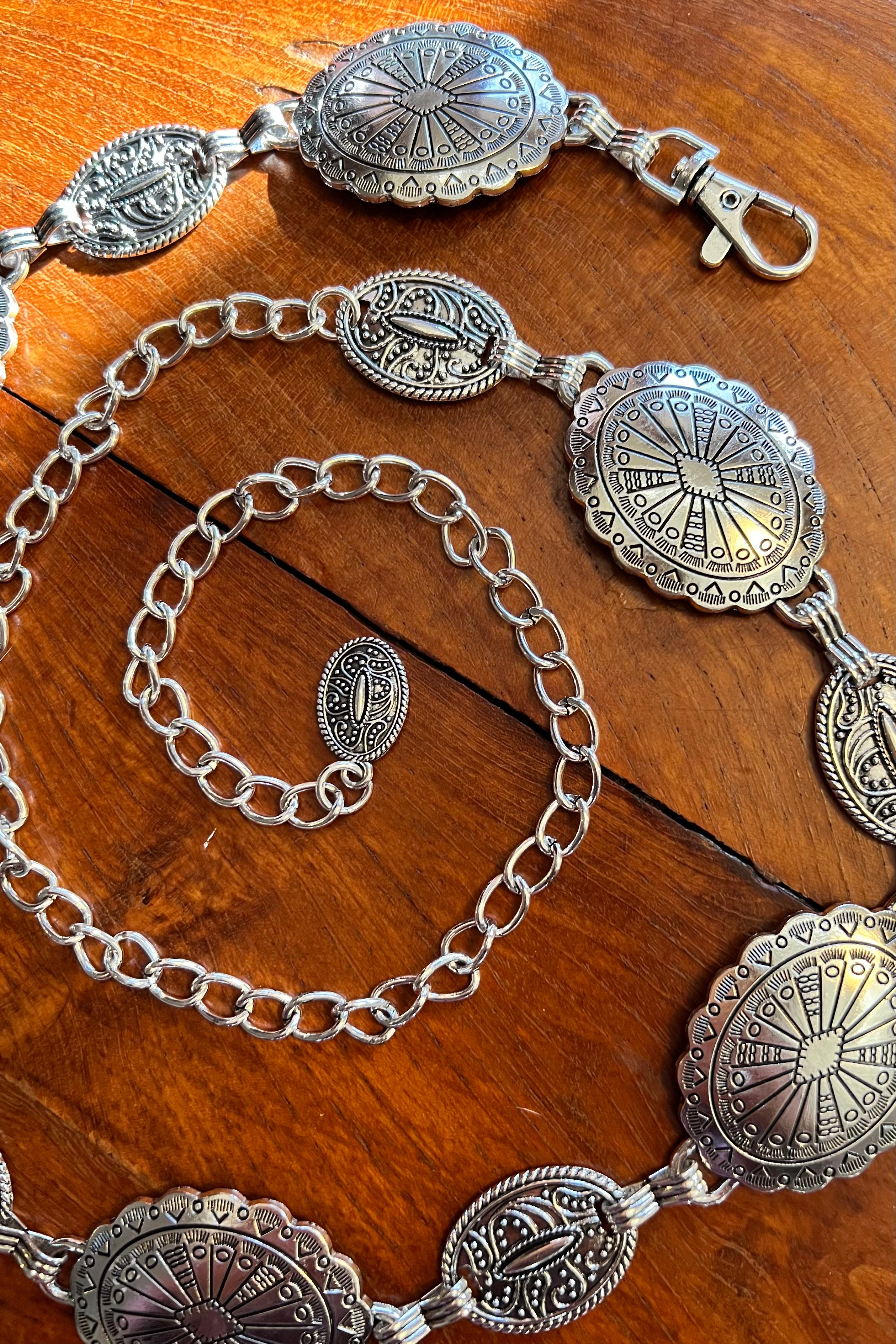 Silver finish concho chain belt with engraved oval medallion and extender - boho festival waist belt Australia.