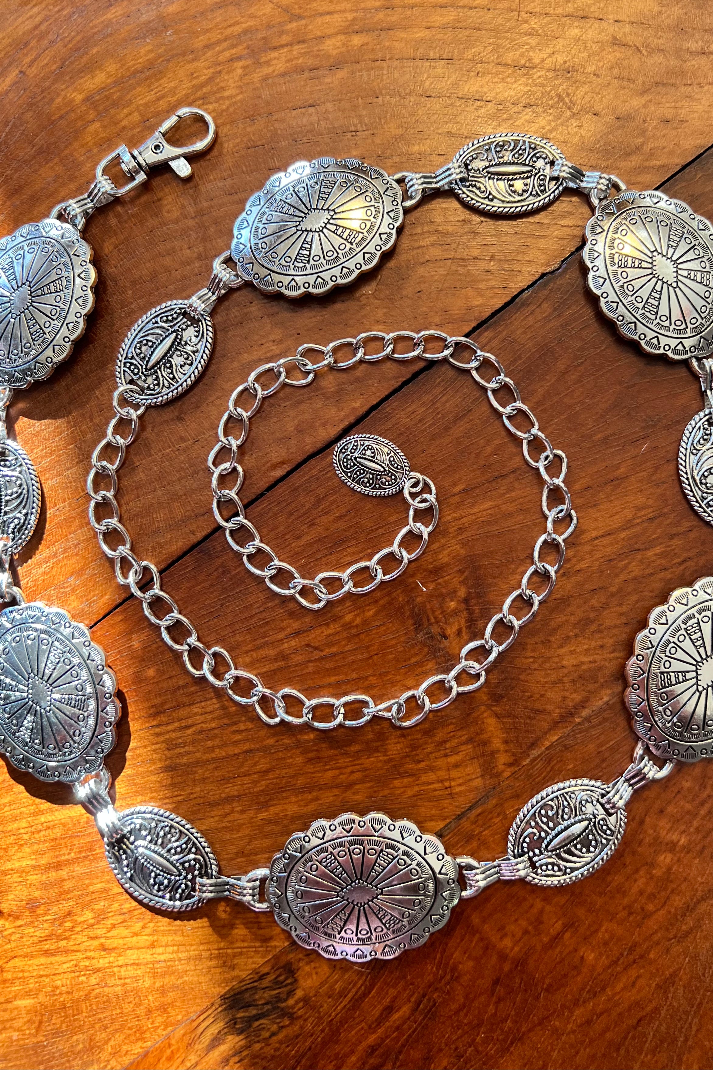 Silver finish concho chain belt with engraved oval medallion and extender - boho festival waist belt Australia.