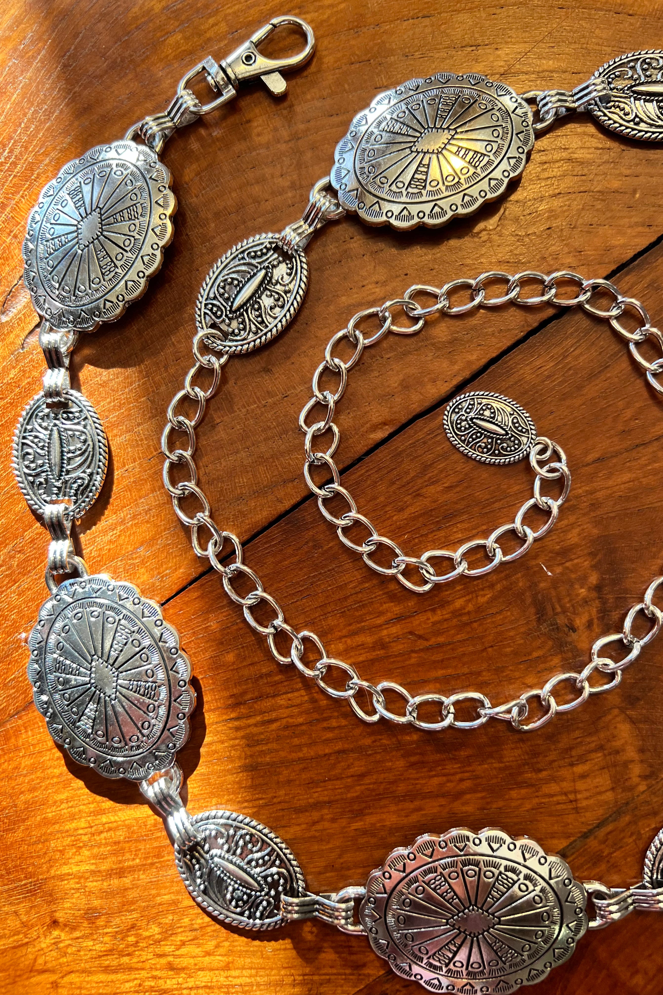 Silver finish concho chain belt with engraved oval medallion and extender - boho festival waist belt Australia.