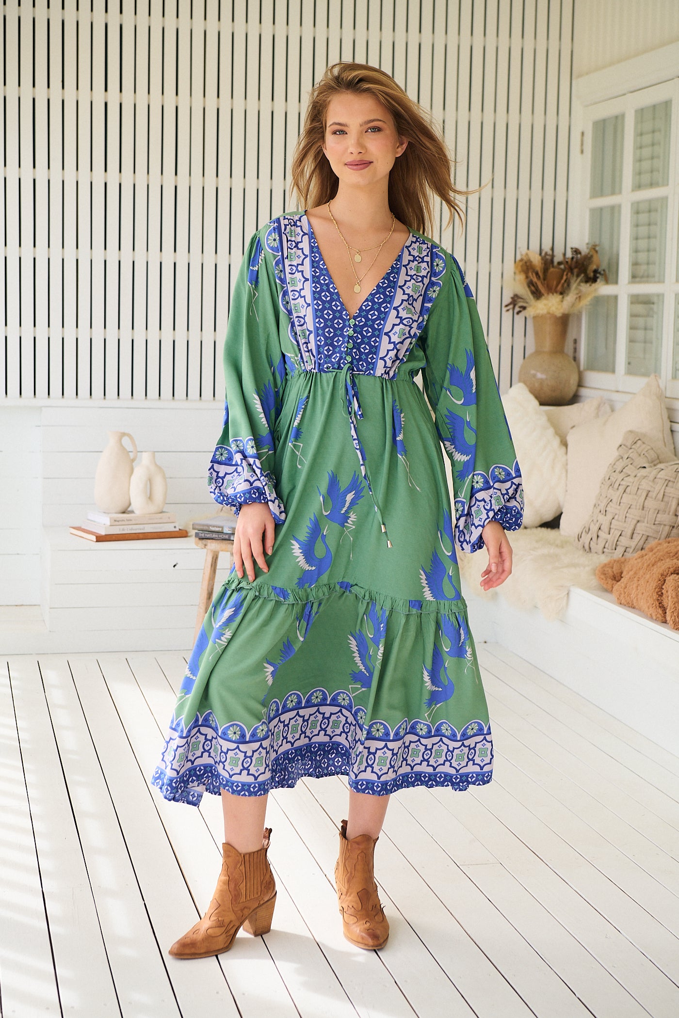 Model wearing Bluebird Willa Boho Midi Dress by Jaase - floral print, long sleeves, 100% rayon, relaxed fit.
