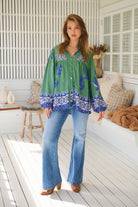 Model wears rayon Boho blouse with vintage print - feminine & effortless