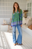 Model wears rayon Boho blouse with vintage print - feminine & effortless