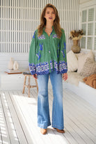 Model wears rayon Boho blouse with vintage print - feminine & effortless