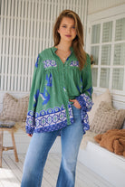 Model wears rayon Boho blouse with vintage print - feminine & effortless